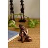 Resting Buddha On Knee Metal Showpiece (Brown,)