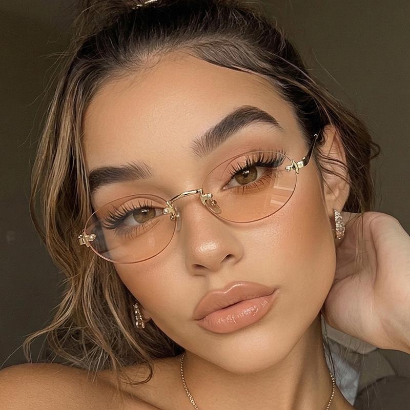 Frameless oval sunglasses for women, new small frame imperial sister style metal glasses, hot-selling fashion sunglasses