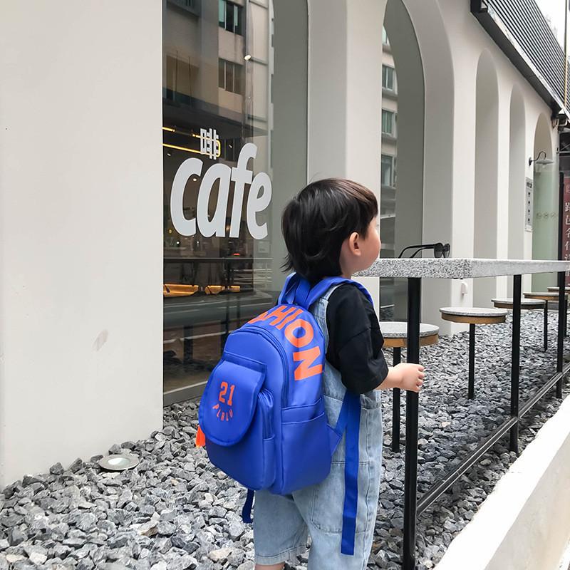 Sac à dos élégant et durable en nylon pour enfants avec un design moderne et respirant, disponible en plusieurs couleurs