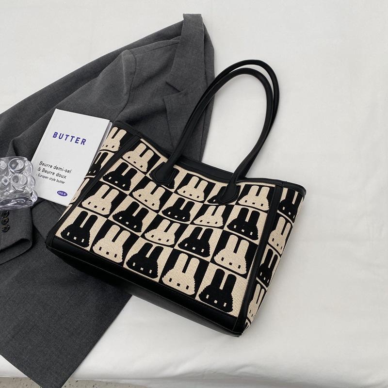 This year's popular bag women's 2025 new fashion niche shoulder canvas bag versatile large-capacity commuter tote bag