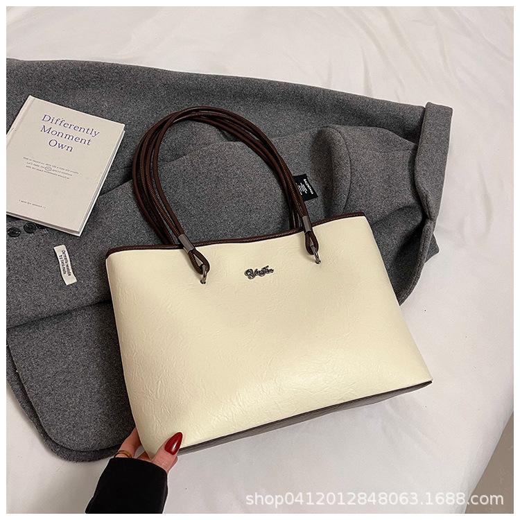 

Тренд 2025 Большая вместимость Новая портативная женская большая сумка Женственность Премиум Тренд Сумка-тоут Женская сумка белый