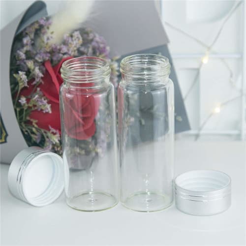 6 mini glass bottles with silver aluminum lids and white plastic bottoms. Perfect for seasoning, making wishes, or drifting. Silver aluminum lid - 40m