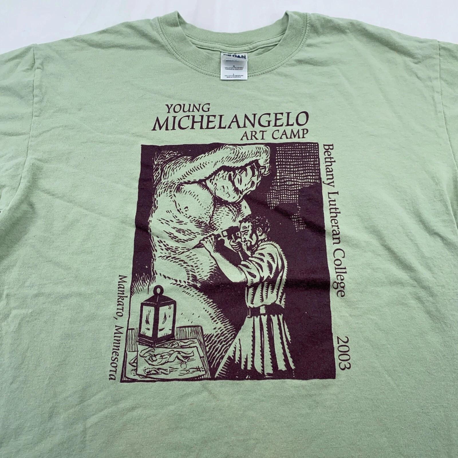 

Vintage YOUNG MICHELANGELO ART CAMP BETHANY LUTHERAN COLLEGE T-Shirt M/L L