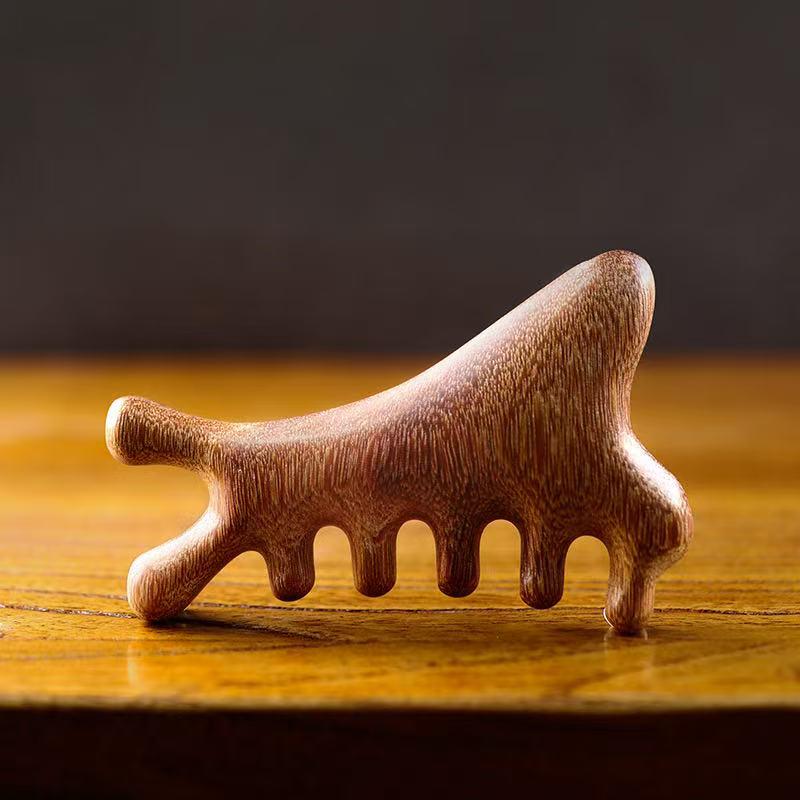 

Golden Sandalwood Wide-Tooth Dolphin Massage Comb for Head, Eye, Shoulder, and Neck