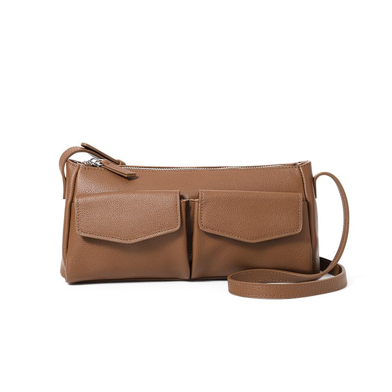 2025 new high-grade niche leather postman female Baotou layer cowhide commuter one-shoulder underarm bag