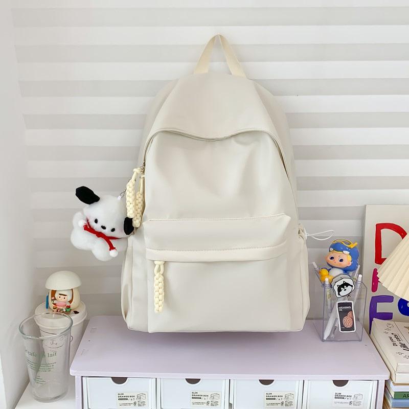 Schoolbag simple solid color schoolbag female Japanese large-capacity backpack junior high school student college student lightweight backpack 