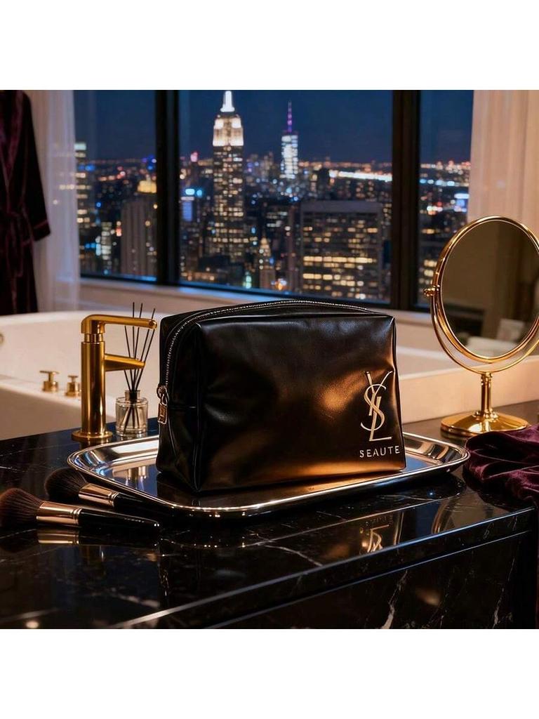 YSL - Black patent leather cosmetic bag with gold logo and zipper closure