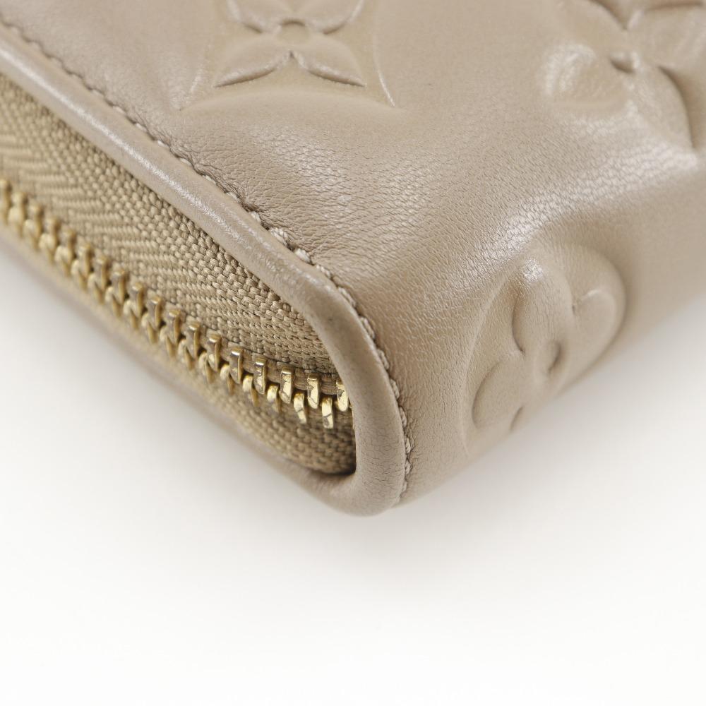 LOUIS VUITTON Zippy wallet Purse M81511 Monogram Coussin Taupe beige lambskin Women Used