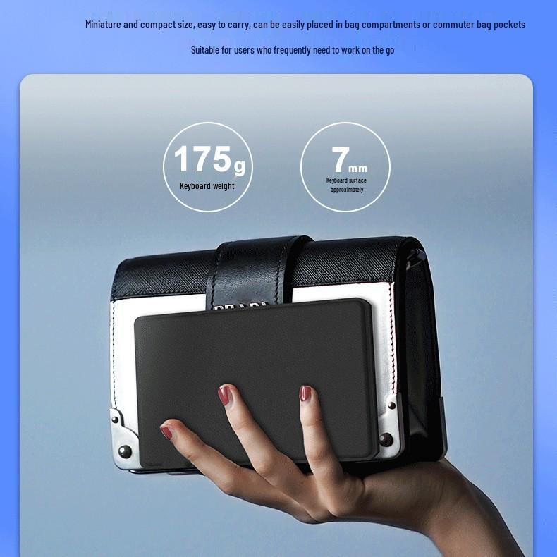 Dual-Fold Mini Bluetooth Keyboard with Touch Numeric Keys - Multi-System Compatible.