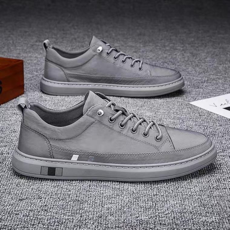 Výrobce 2024 nové prodyšné pánské boty s plochou podrážkou černé plátěnky trendy všestranné nazouvací ležérní boty pánské