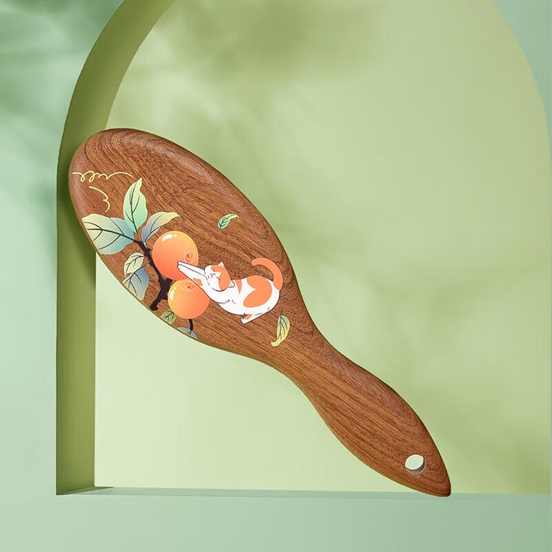 

Tan Mujiang Lucky Orange Teak Air Cushion Massage Comb