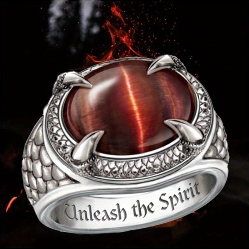 Oval dark stone ring with woven texture. Unique shape, ideal for Western themes—rustic and retro style.