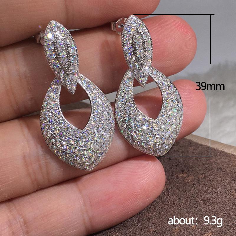 2025 European & American Fashion Hollow Water Drop Stud Earrings with Zircon Inlay
