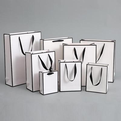 White Gift Bags for Women's Clothing, Jewelry, and Beauty Packaging