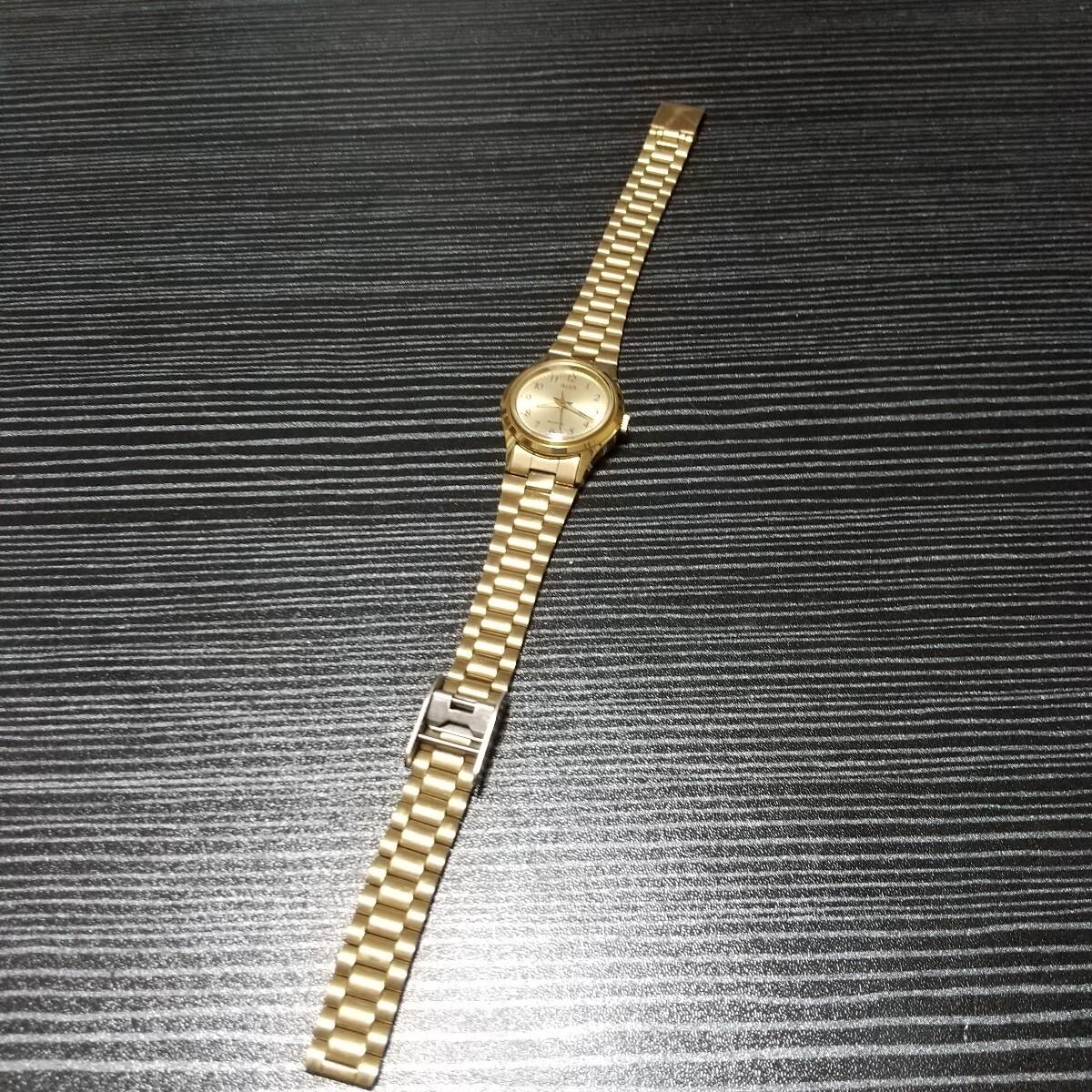 Alba quartz ladies gold dial junk item