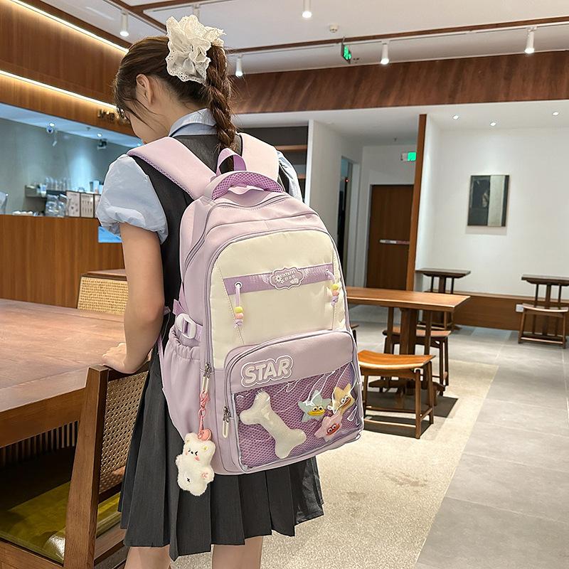 Small fresh contrasting color schoolbag niche design casual versatile children's backpack high value light burden reduction shoulder
