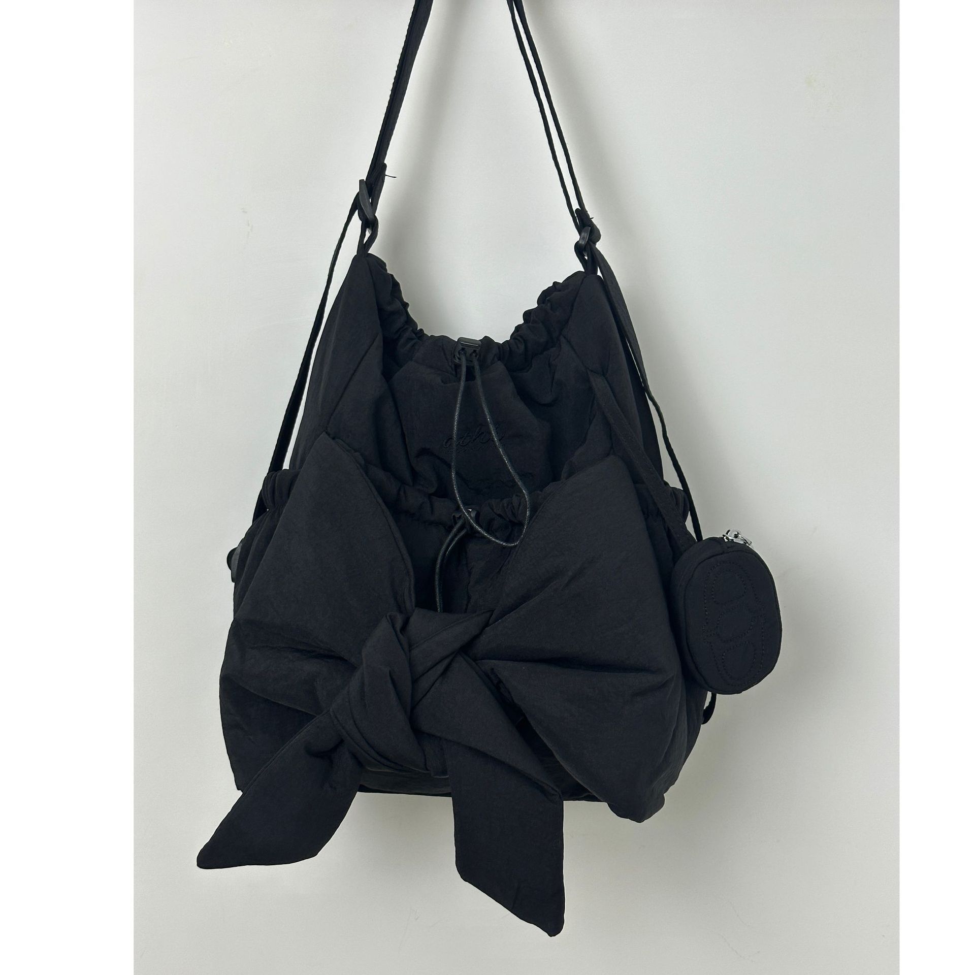 

Korean ath cloud bag - bow strap designer model can be single shoulder can double shoulder casual dual-purpose bag capacity 29*13*34 чёрный