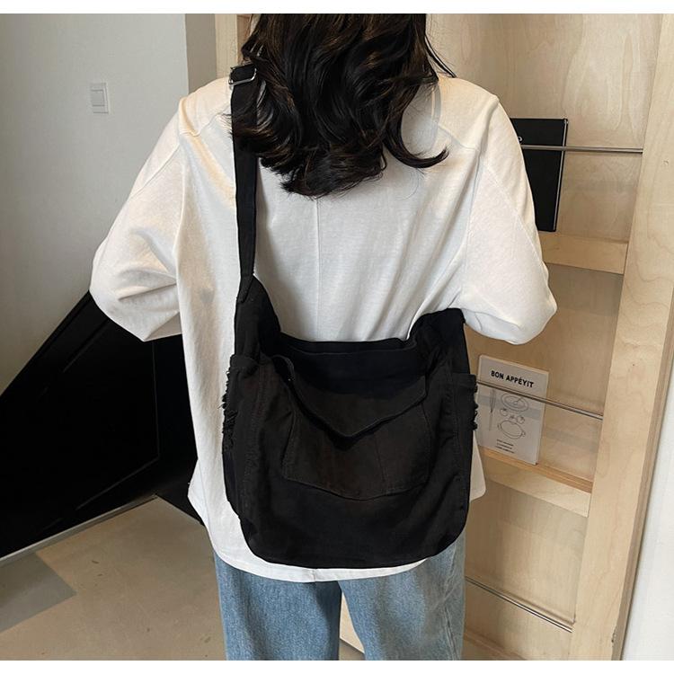 Canvas bag women's large-capacity new summer casual high-end niche lazy wind messenger bag