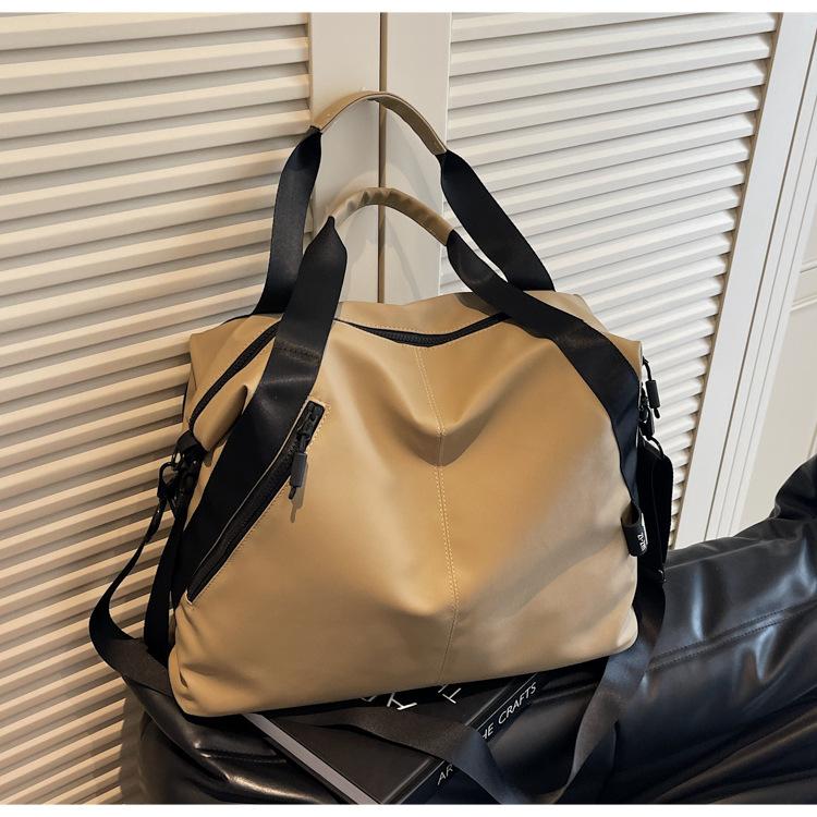 Large capacity travel bag women's new casual shoulder messenger bag versatile sports commuter tote bag