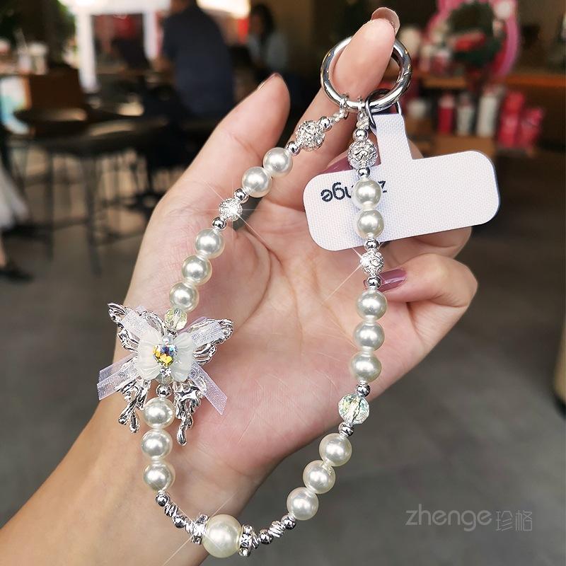 

High-end gemstone butterfly pearl mobile phone chain ins fashion women s wrist pendant beaded chain short style [white] gem butterfly pearl bracelet