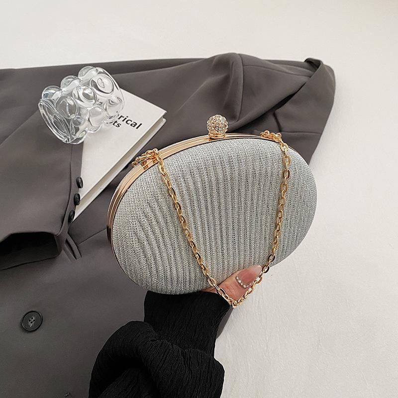 

Bag 2024 new shoulder European and American fashion bright stars ins Internet celebrity women chain box bag tide срібний