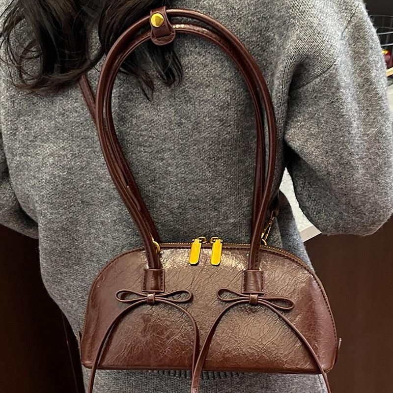 Autumn new baguette bag bow shoulder armpit bag women's new fashion bag bowling bag
