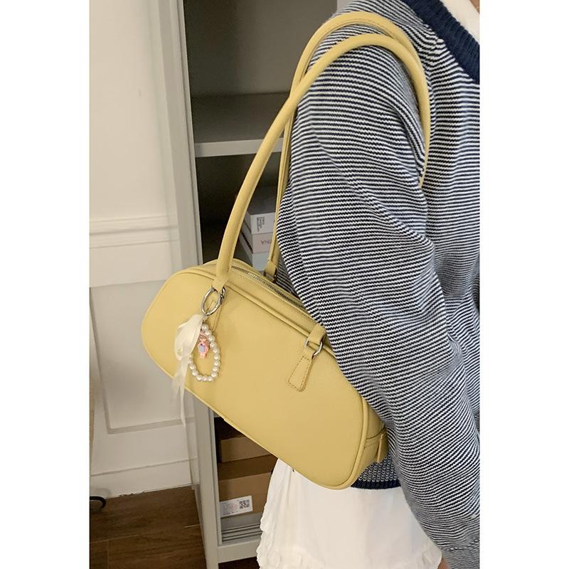 Niche texture portable bowling bag women's new fashion underarm bag simple and versatile shoulder bag