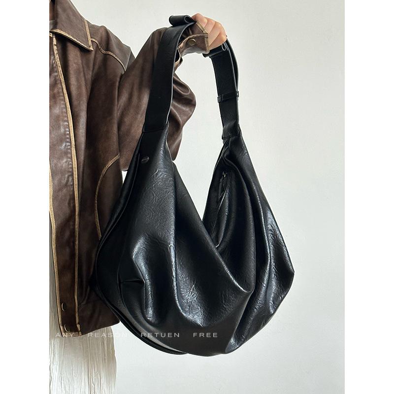 

Вместительная ретро сумка-пельмень из мягкой кожи женская 2025 новая высококачественная повседневная сумка тоут через плечо чёрный