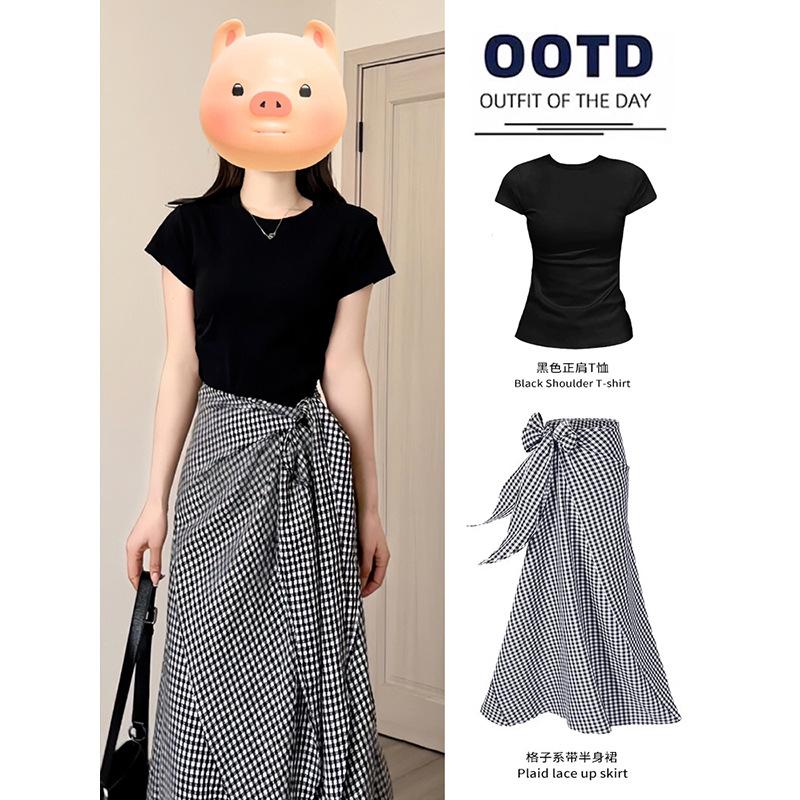 

Black and white plaid skirt long skirt women s summer irregular half skirt small straps a word beautiful wear L