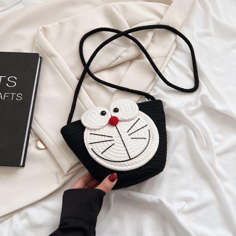 

Cute Cartoon Doraemon Shoulder Cross Woven Bag Summer Bag Women 2025 New Ins Bucket Bag Niche чорний