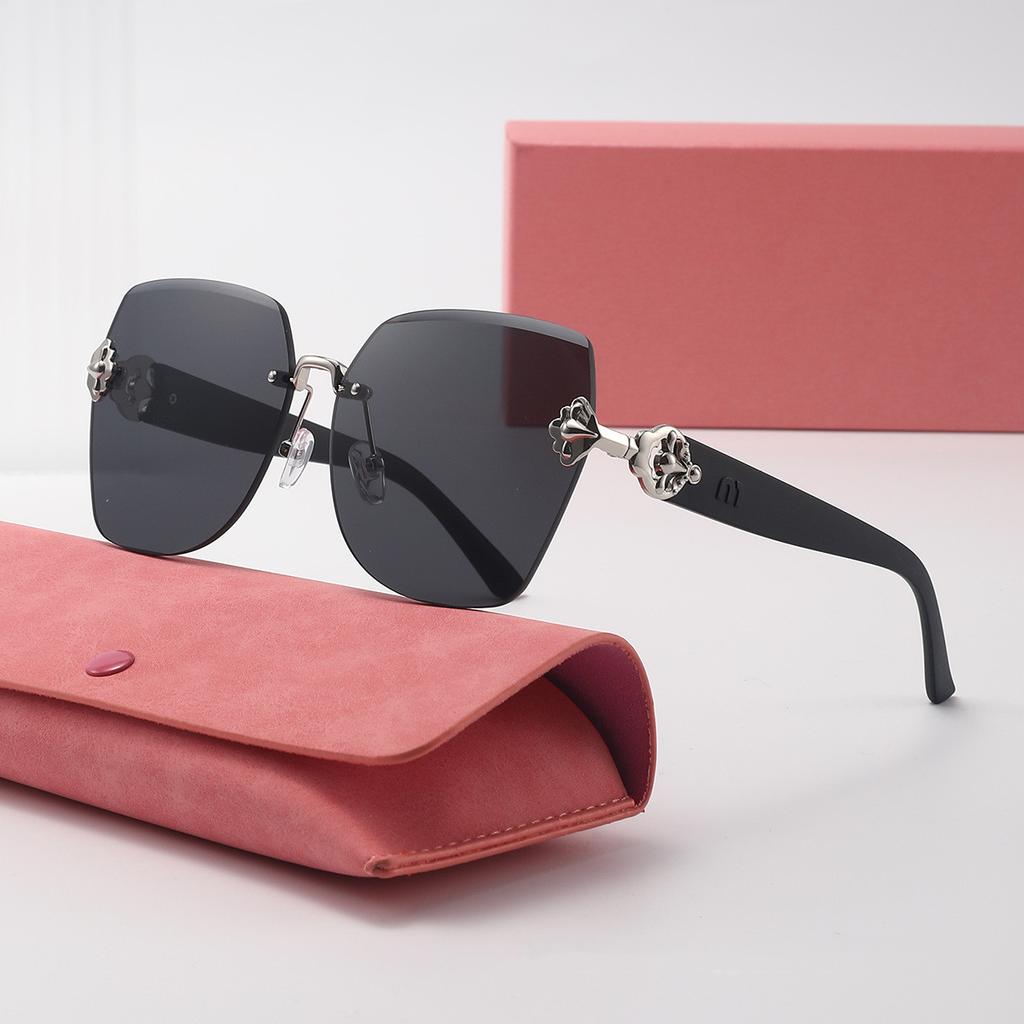 new large frame light luxury frameless fashionable sunglasses for women UV protection small sunglasses(DS-2402)