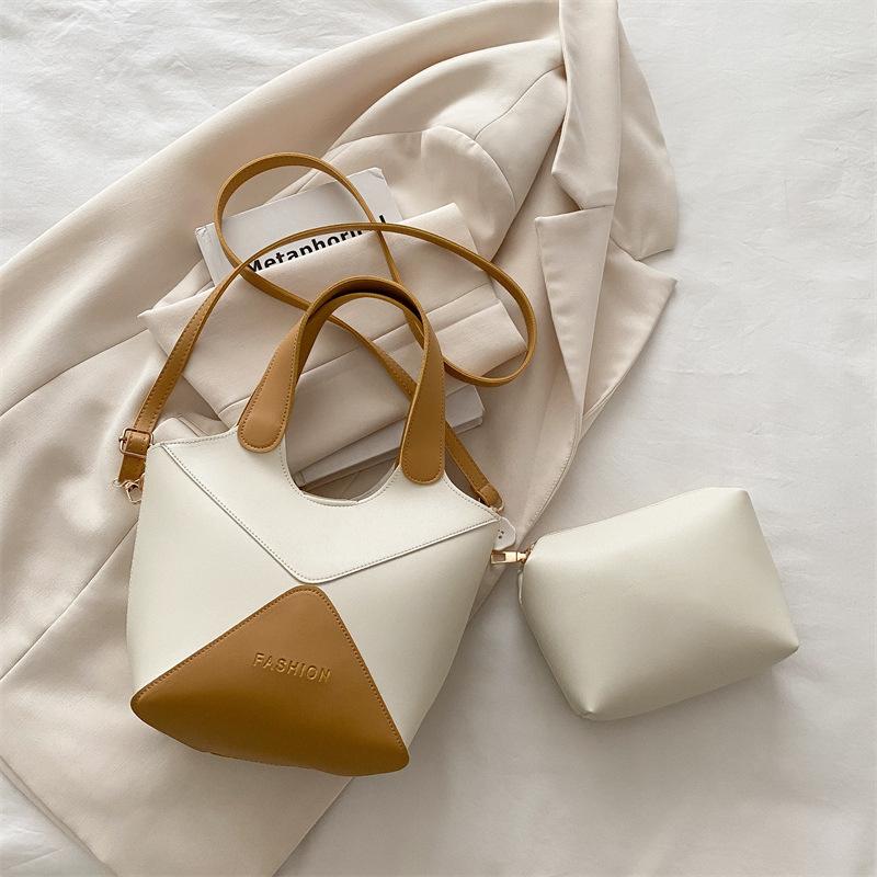 

The new bag women s 2025 popular bucket bag summer niche retro contrasting color crossbody portable work small bag хаки