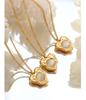 Hong Kong-Style Elegant Heart-Shaped Cat's Eye Stone Pendant Necklace On Gold-Plated Clavicle Chain.