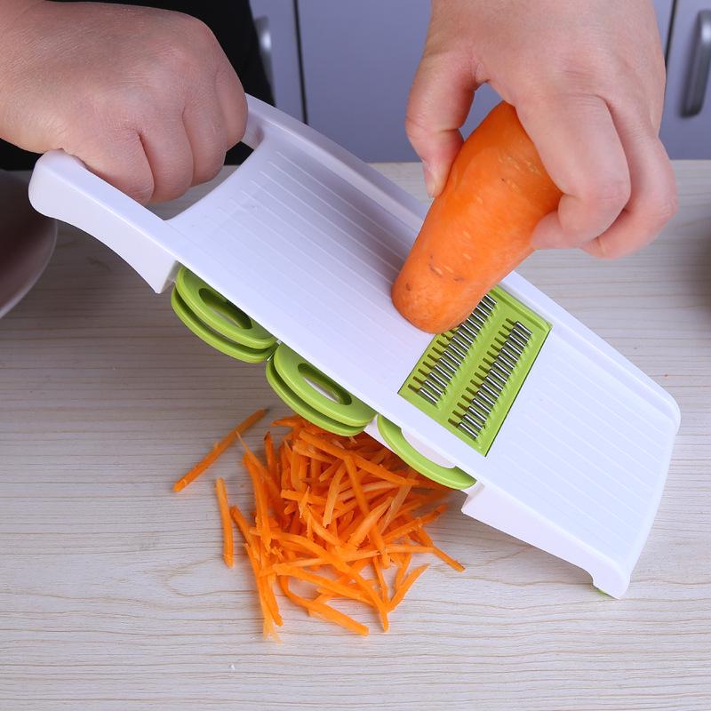 9-in-1 Vegetable Slicer & Peeler: Multifunctional Grater, Shredder, Julienne, Chopper, and Cutting Board