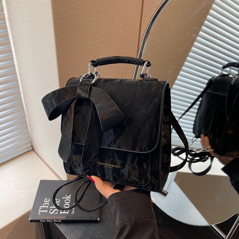 

Рюкзак с бантом, женский модный нишевый студенческий школьный рюкзак с высоким чувством стиля, легкий дорожный рюкзак чёрный