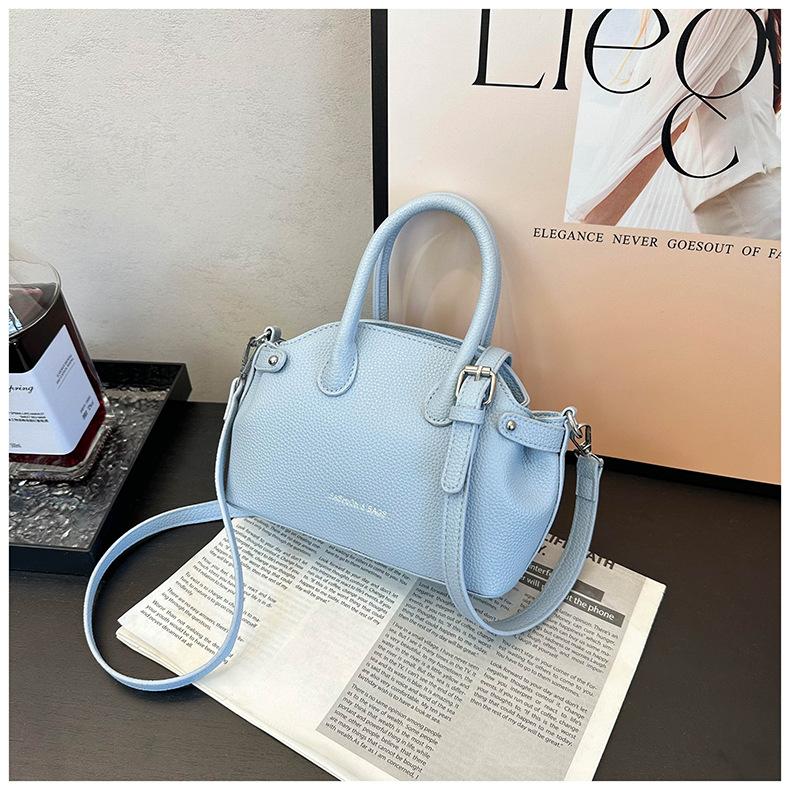 2025 new small bag women's summer versatile shoulder messenger bag retro popular portable bucket bag this year