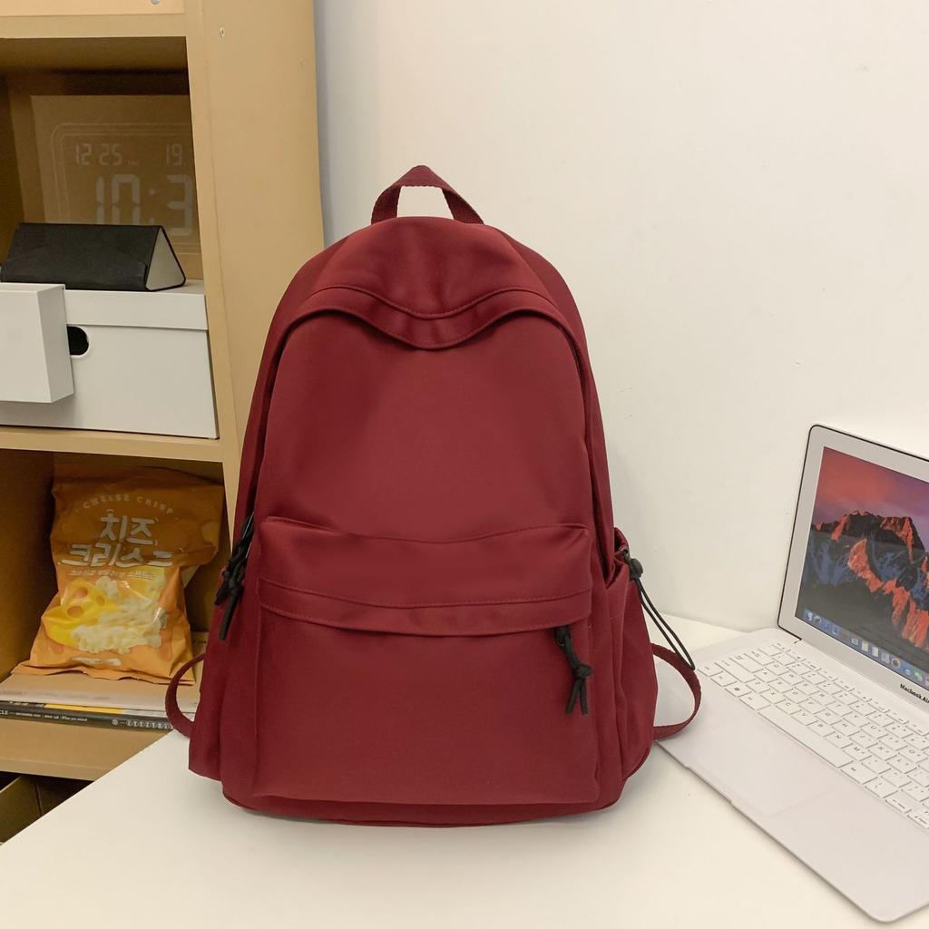 Japanische Schultasche für Studentinnen, koreanische Version, große Kapazität, einfacher einfarbiger Rucksack für Jungen der Unterstufe.