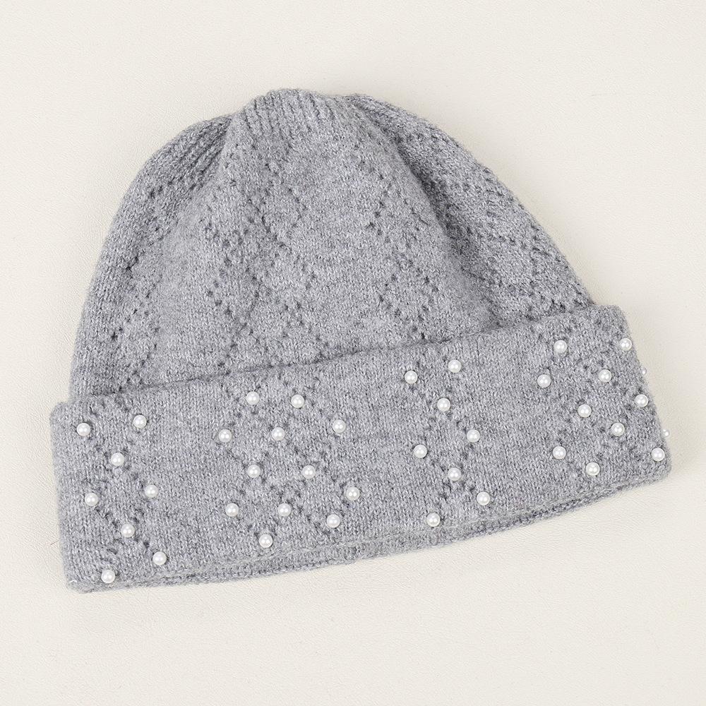 Autumn and winter new warm little pearl fashion knitted hat outdoor riding windproof and cold thickened versatile wool hat