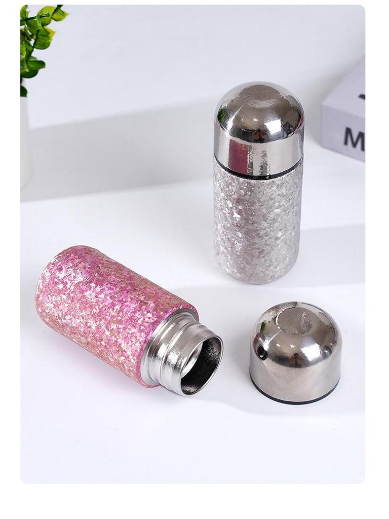 > Sleek Mini Titanium Antibacterial Double-Layer Thermos Cup - Portable, High-Value, Pocket-Sized.