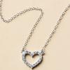 A Pendant Necklace for Women with a Rhinestone-embellished Hollow Heart Design for Valentine's Day