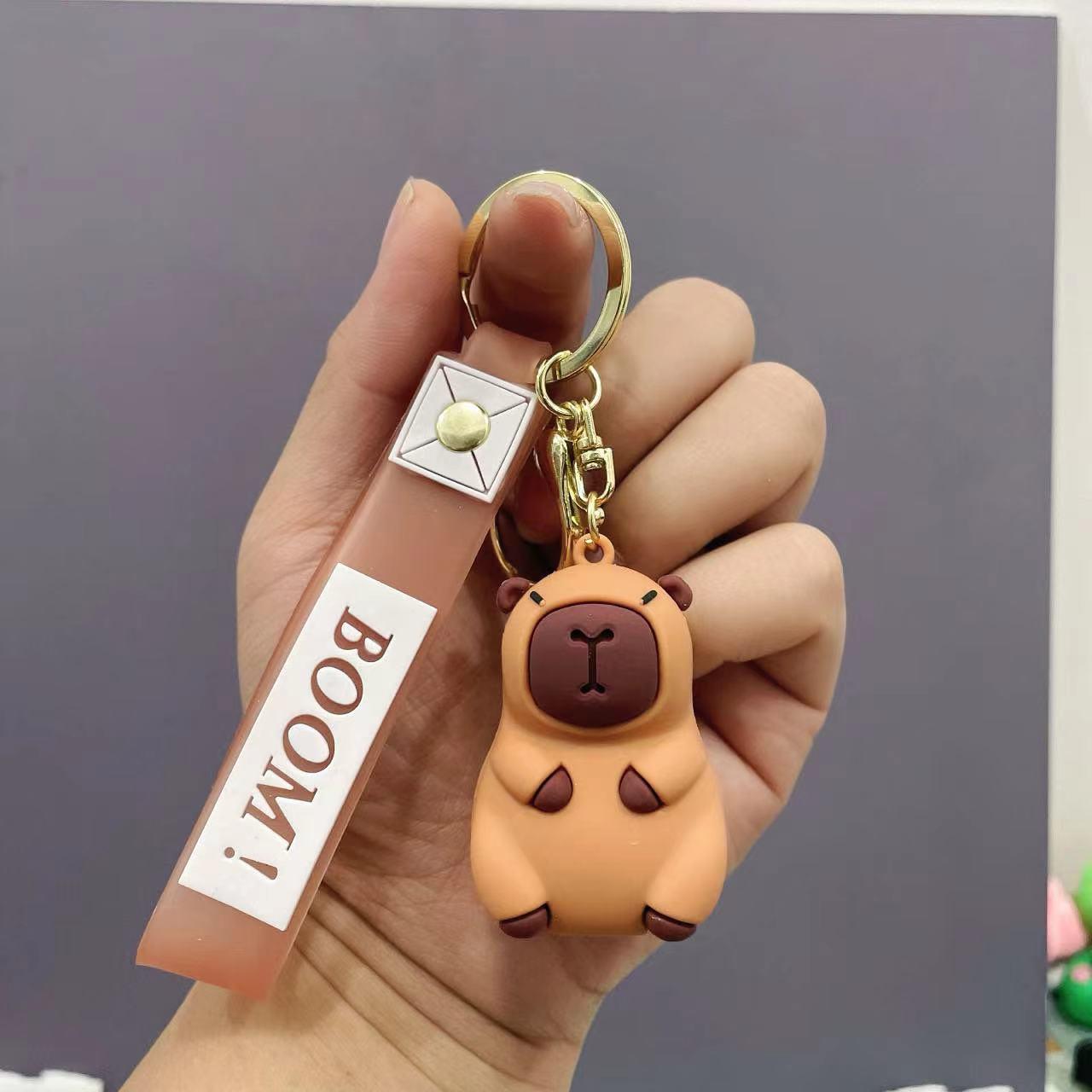 

Adorable Capybara Keychain: Ugly-Cute Pendant for Backpack or Car Charm Gift