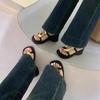 French black thick-bottomed cool slippers women's 2025 summer new niche fashion simple metal one-word beach slippers