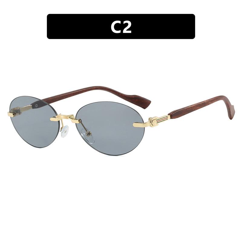 

Frameless trimmed oval sunglasses for fashion shows and street snaps, UV protection, sun protection and stylish sunglasses світло-сірий колір