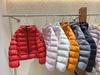 Autumn and winter new down jacket women's short hooded ribs white duck down large size versatile jacket tide