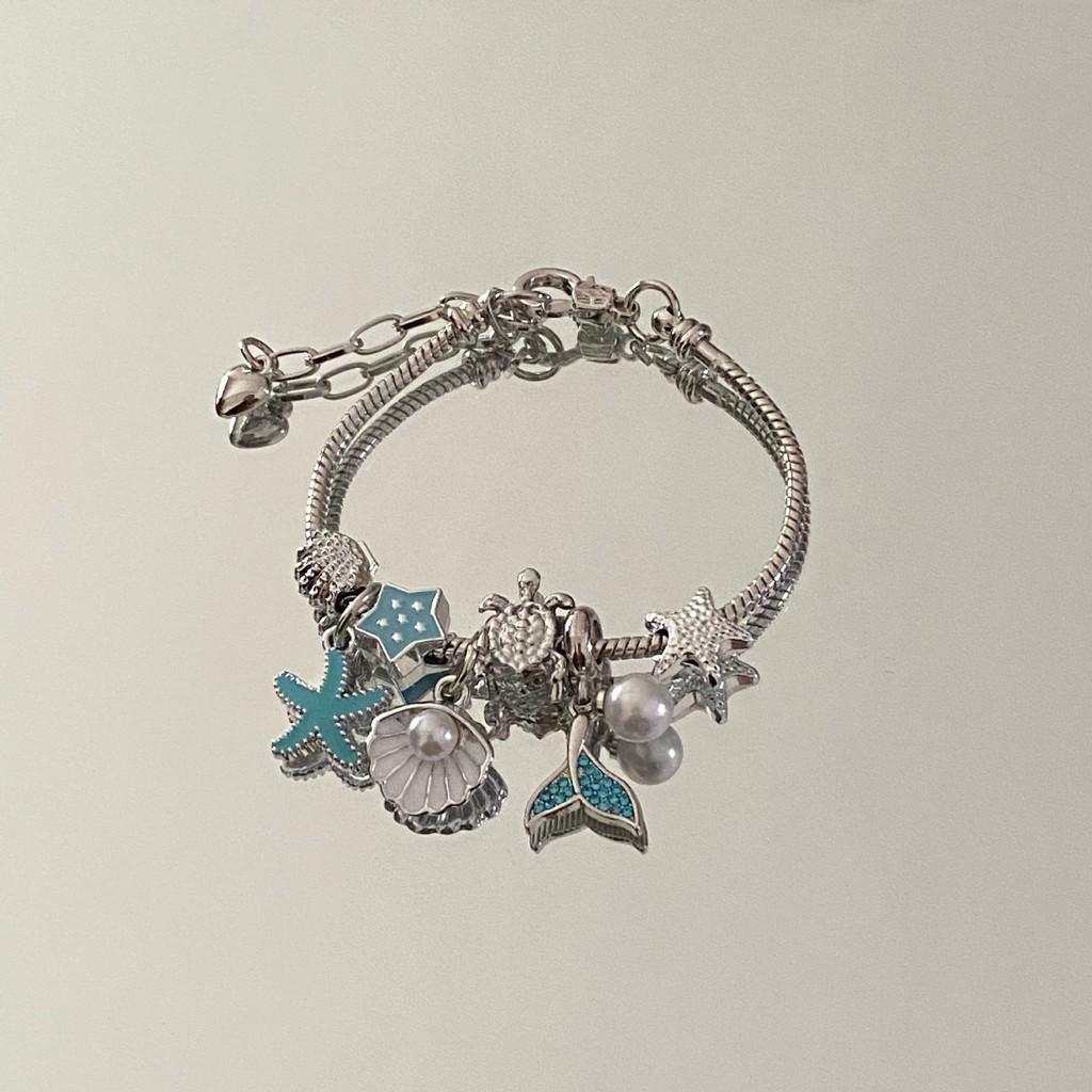 Ozean-Stil Perlenarmband mit Seestern- und Schildkröten-Anhängern für Unisex-Reisegeschenk