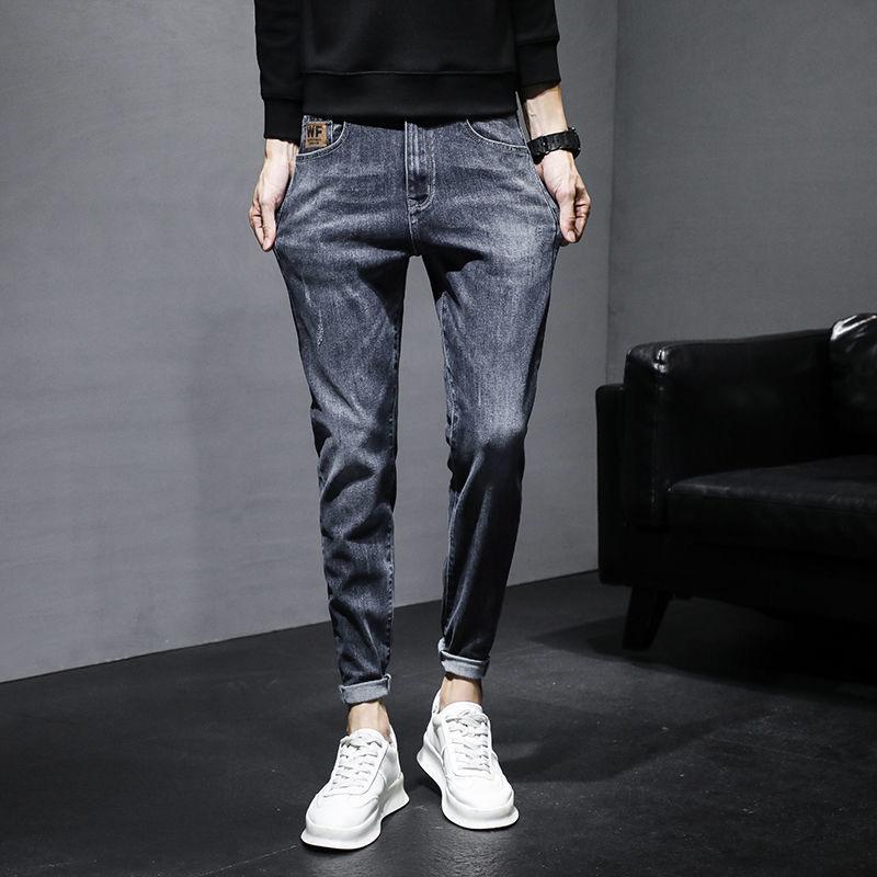 Vaqueros para hombre marea versión coreana de la marea de primavera y otoño flujo Slim pies pequeños nuevo verano sección delgada pantalones largos vaqueros negros para hombre