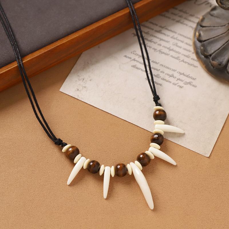 Hand-woven imitation wolf tooth wood bead necklace, retro niche dog tooth tribe men's and women's personalized sweater accessories