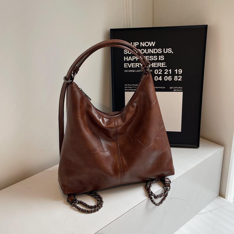 

Retro high-end backpack women s bag 2024 new trendy Korean niche tote bag casual large-capacity bag темно-коричневого кольору