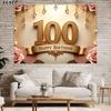 A dazzling 100th birthday banner background cloth, elegant golden design, birthday celebration event