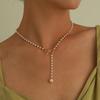 Elegant Pearl Bowknot Tassel Pendant Necklace: High-End Autumn Winter Women's Fashion